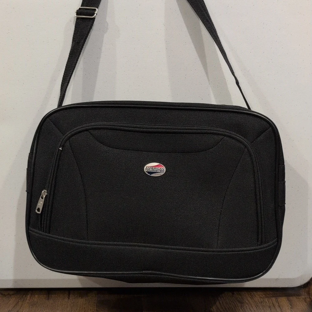 American Tourister black carry on shoulder bag